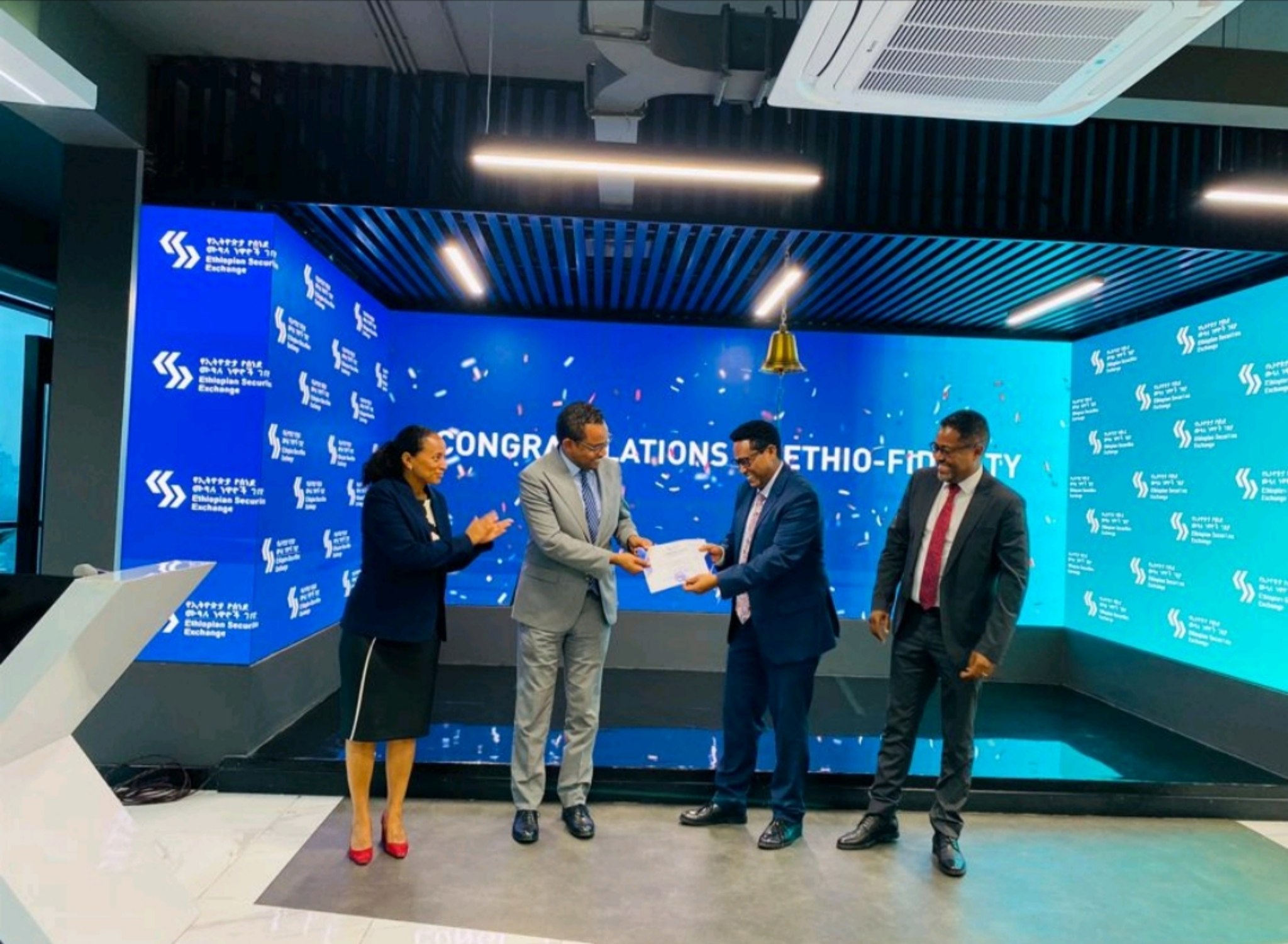 An Ethio Fidelity director accepting the ESX trading membership certificate on the exchange floor